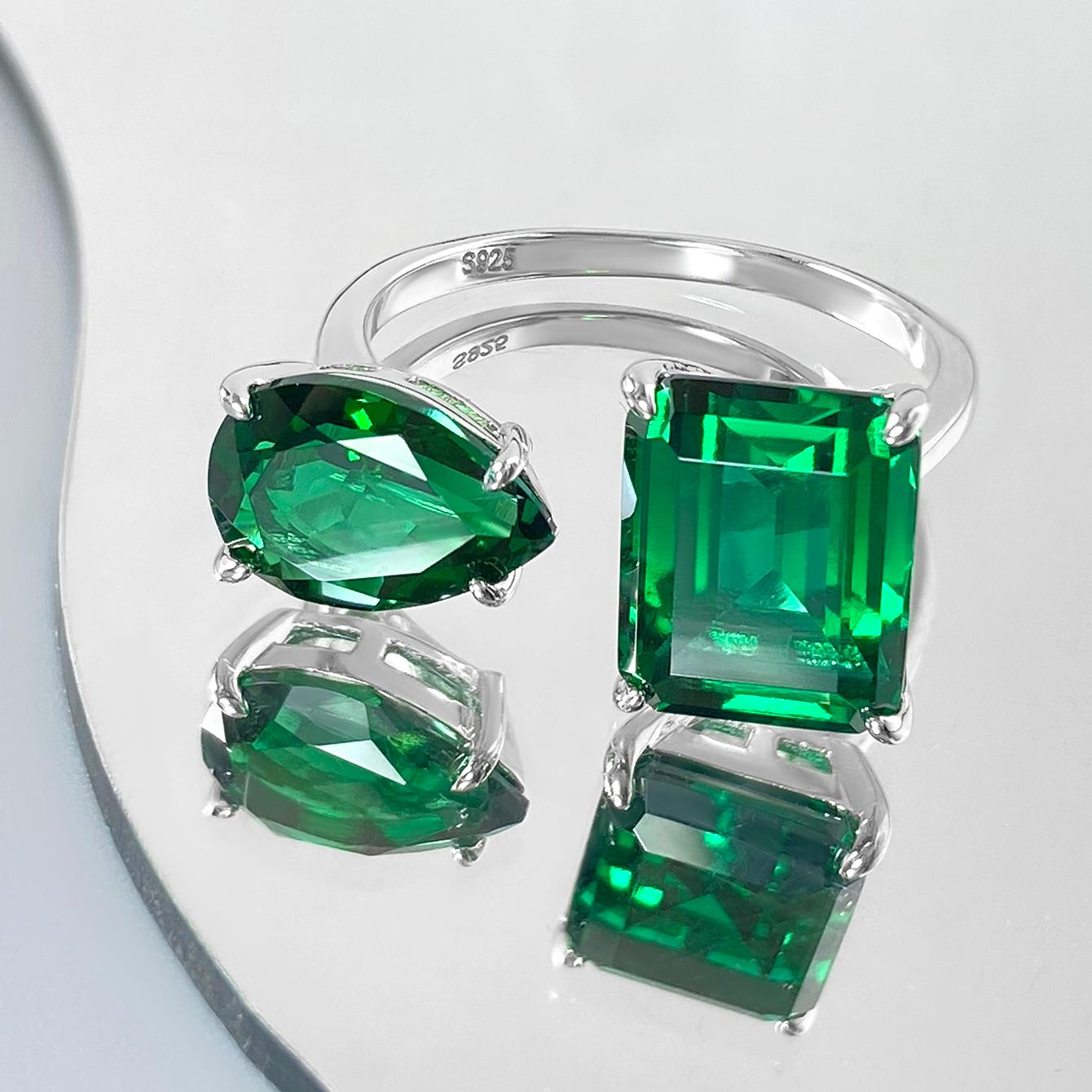 Anillo de compromiso con halo de esmeraldas de laboratorio ovaladas de 1 ct