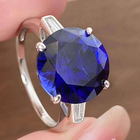 Round Lab Sapphire Three Stone Engagement Ring with Moissanite Side Stone