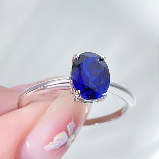 Oval Lab Sapphire Solitaire Engagement Ring