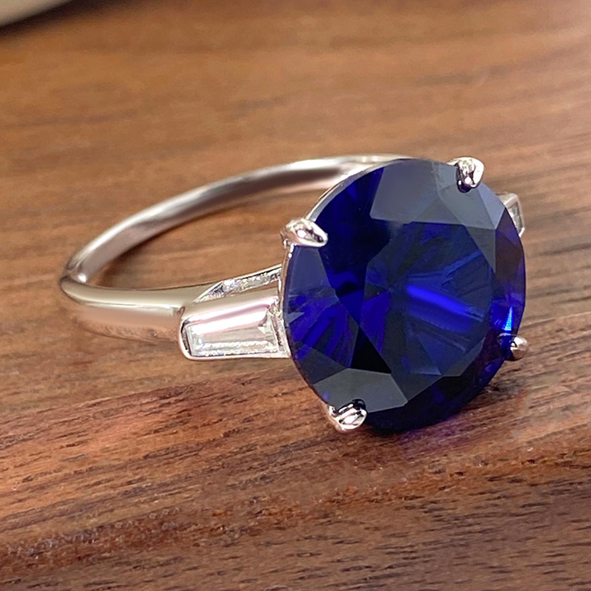 Round Lab Sapphire Three Stone Engagement Ring with Moissanite Side Stone