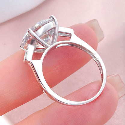 Round Moissanite Three Stone Engagement Ring