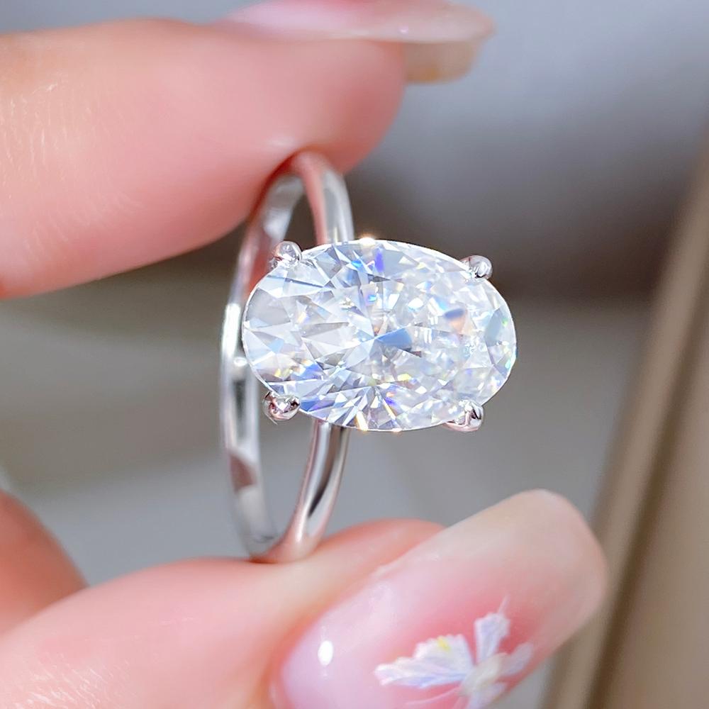 Anillo de compromiso con halo de esmeraldas de laboratorio ovaladas de 1 ct