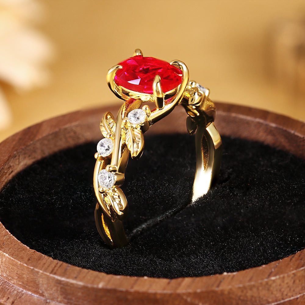 Nature Inspired Oval Cut Ruby Vine and Leaf Engagement Ring