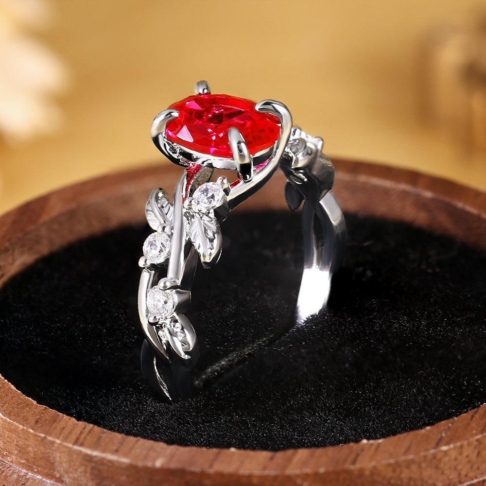 Nature Inspired Oval Cut Ruby Vine and Leaf Engagement Ring