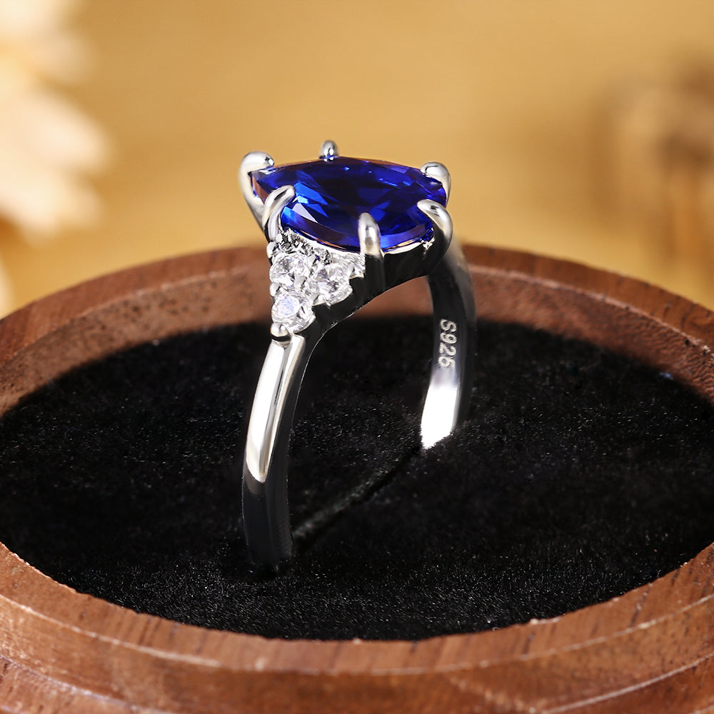 Anillo de compromiso con halo de esmeraldas de laboratorio ovaladas de 1 ct