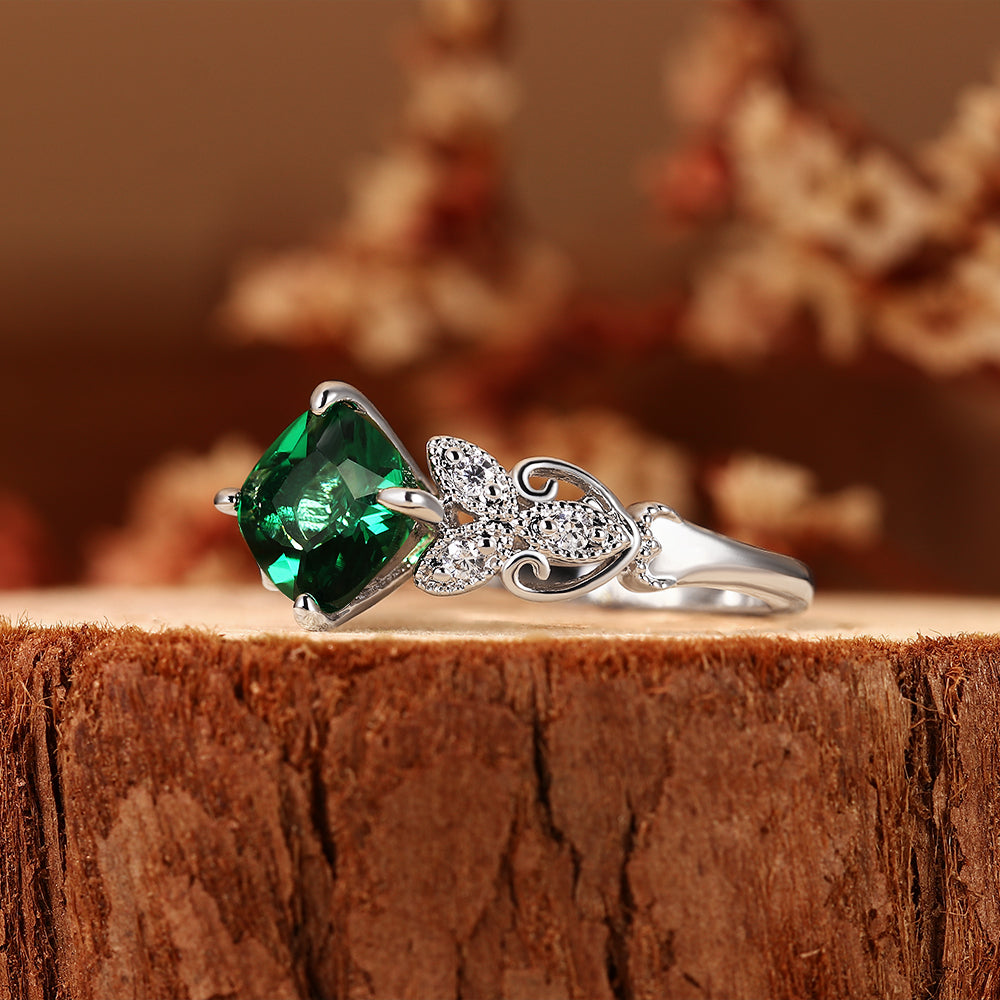 Anillo de compromiso con halo de esmeraldas de laboratorio ovaladas de 1 ct