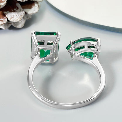 Anillo de compromiso con halo de esmeraldas de laboratorio ovaladas de 1 ct