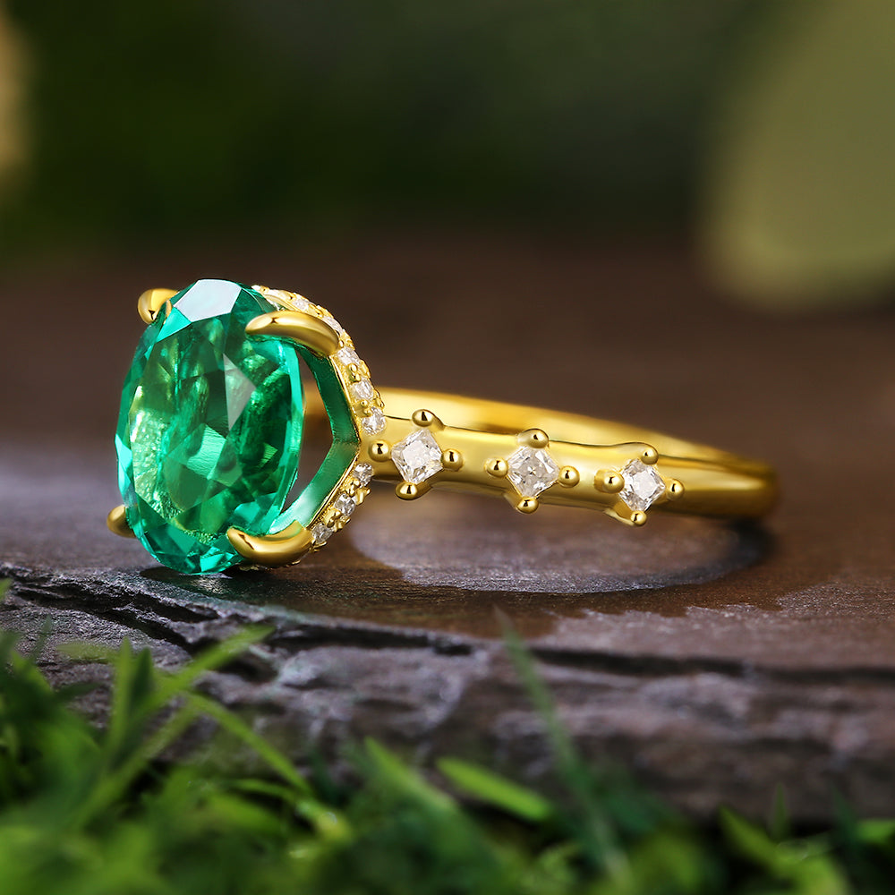 2.8 Ct Oval Cut Lab Emerald Hidden Halo with Princess Cut Moissanite Accents Vintage-Inspired Engagement Ring