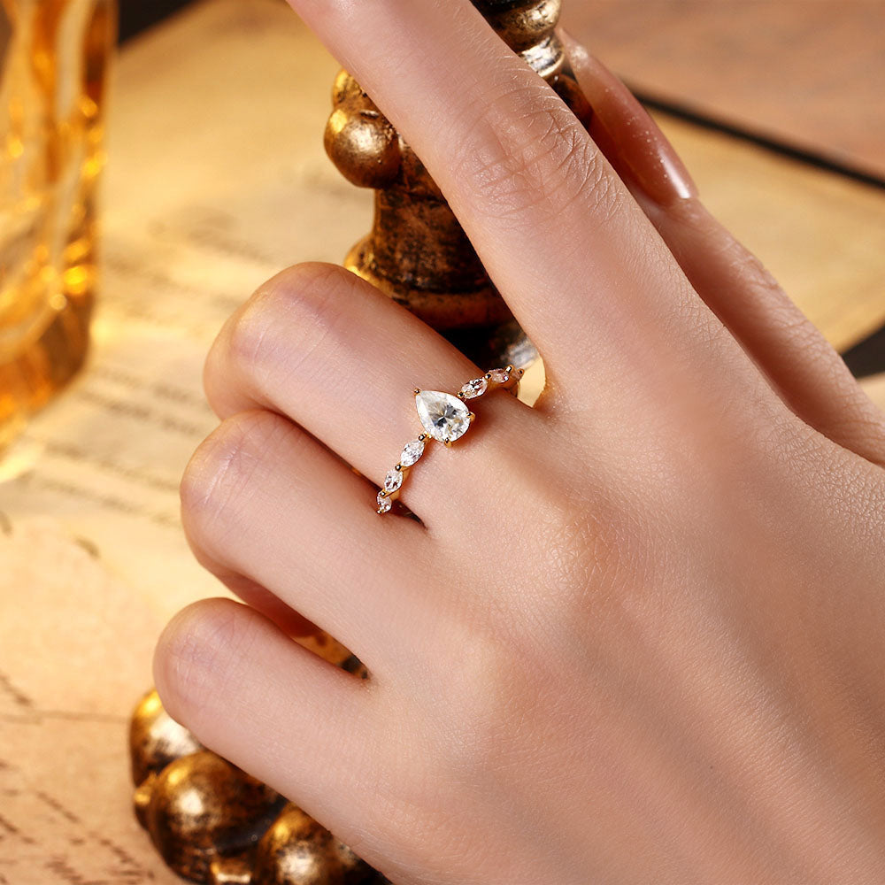 0.8 ct Pear Moissanite Engagement Ring With Marquise Moissanite Accents