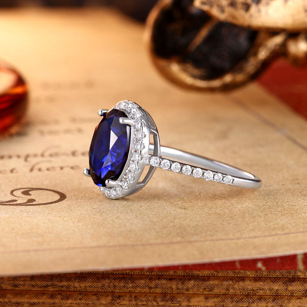 Oval Lab Sapphire Halo Engagement Ring with Moissanite
